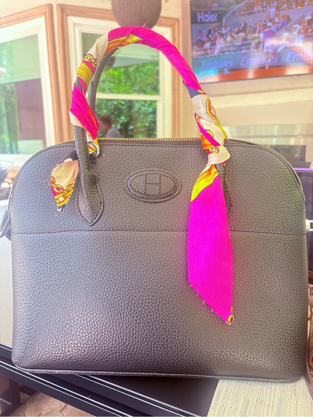 Women's Black Leather Top-Handle Bag with Pink Scarf Accent